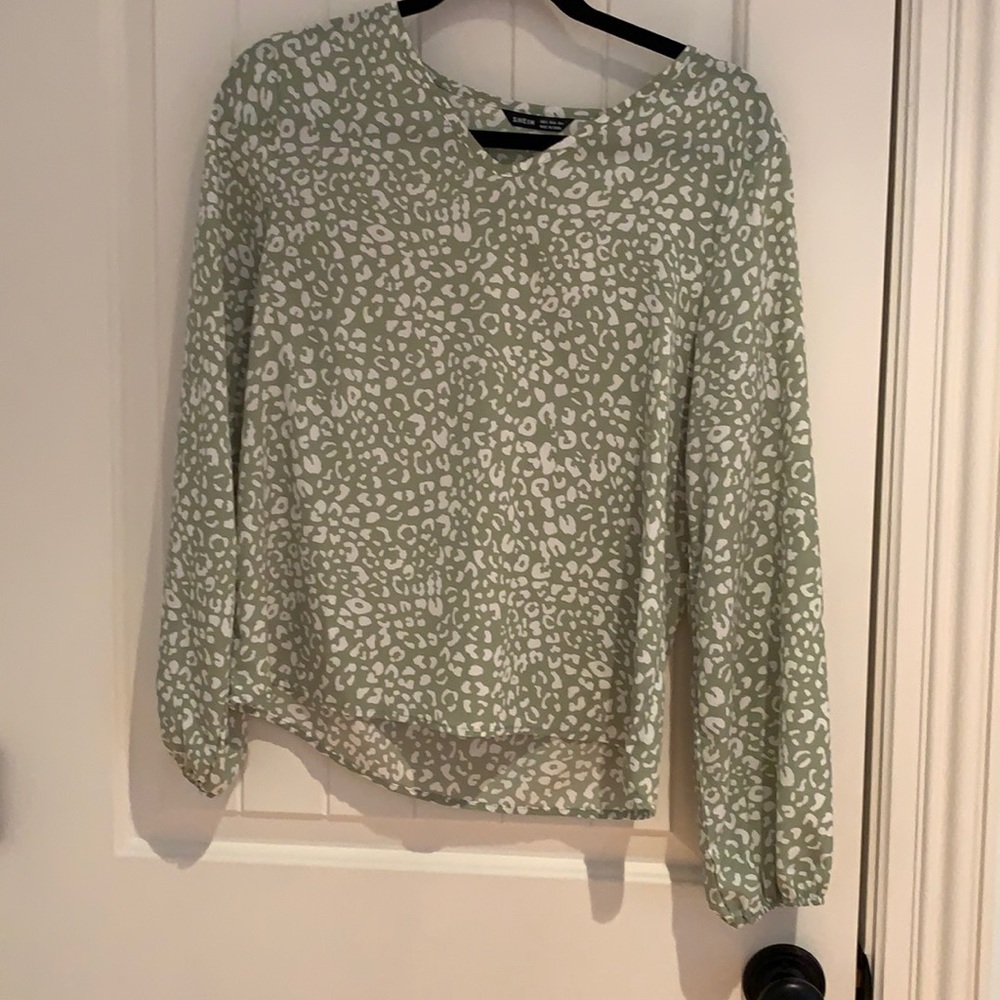 Green and white blouse